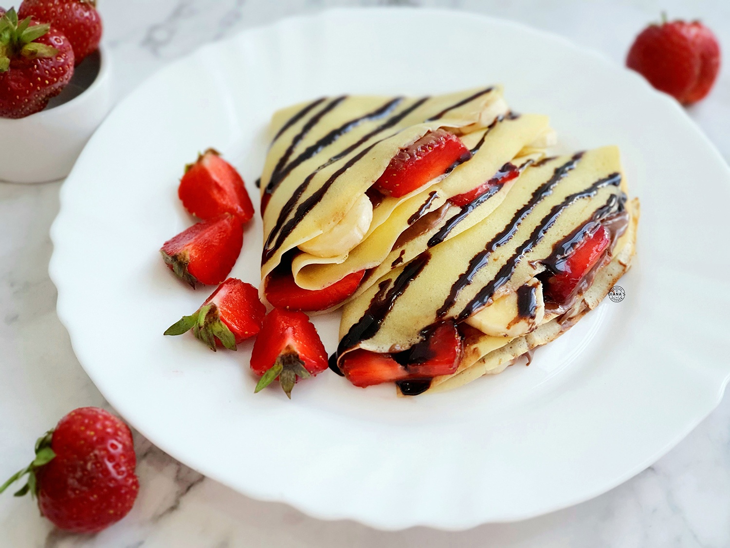 Crepes cu capsuni, banane si Nutella
